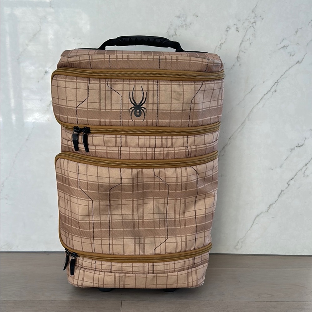 Spyder Plaid Rolling Luggage in great condition